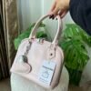 Stella Baby Pink Bag + Charm